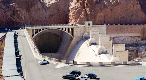 Hoover Dam view at parking and entrance to the massive spillway tunnel at Hoover dam